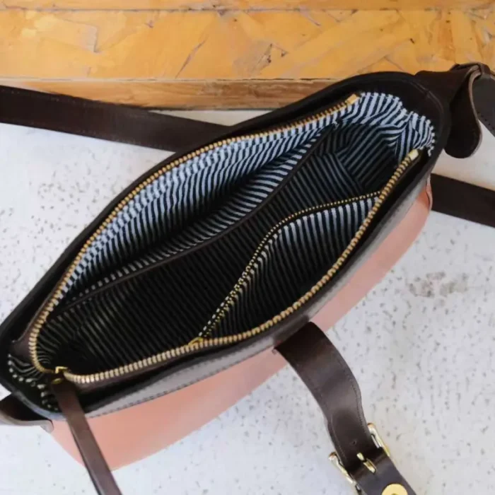 Interior view of Handmade Leather Sling Bag with zipper pocket and compartments