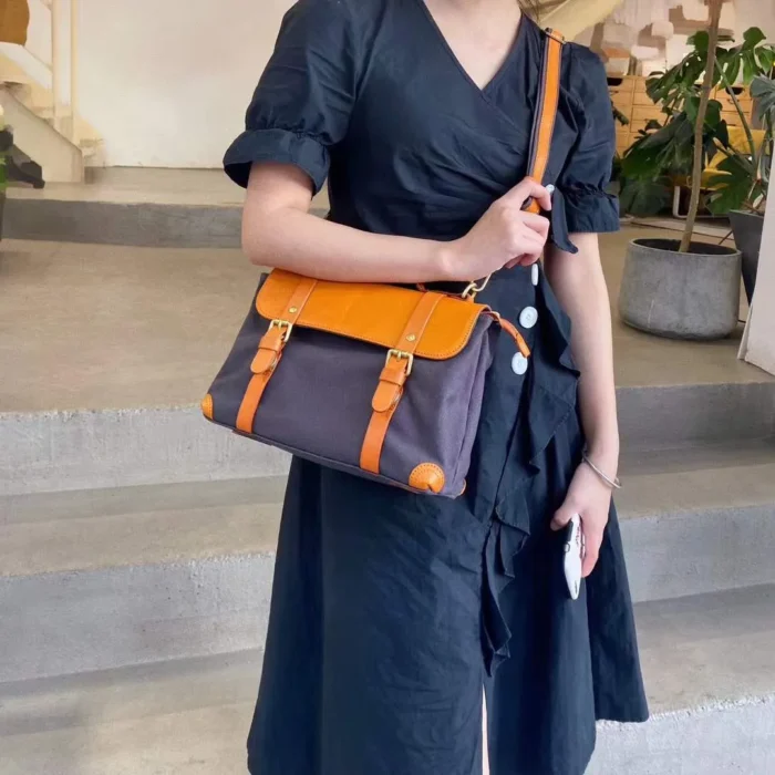 Student Wearing Handmade Vintage Messenger Crossbody Bag – Canvas and Leather