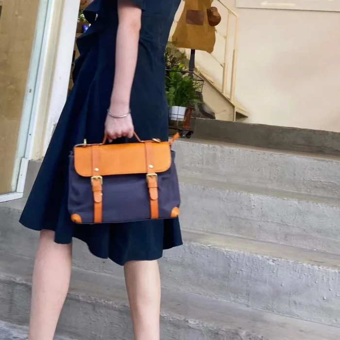 Student Wearing Handmade Vintage Messenger Crossbody Bag – Canvas and Leather
