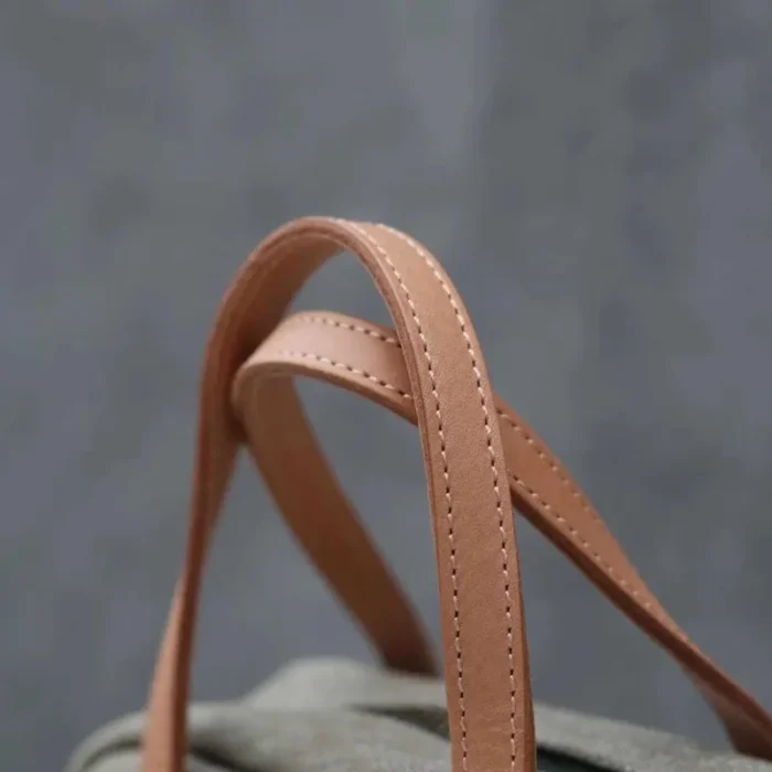 tylish Multi-Way Handbag with vegetable-tanned leather wrist strap