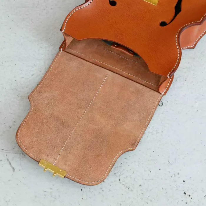 Interior view of vegetable-tanned leather backpack with slip pocket for essentials