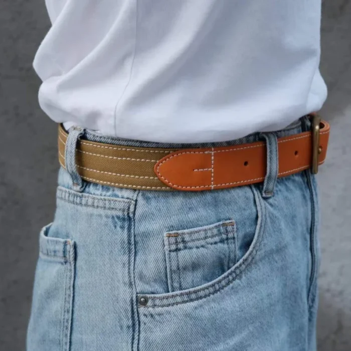 male model wearing black canvas leather belt for versatile everyday outfit