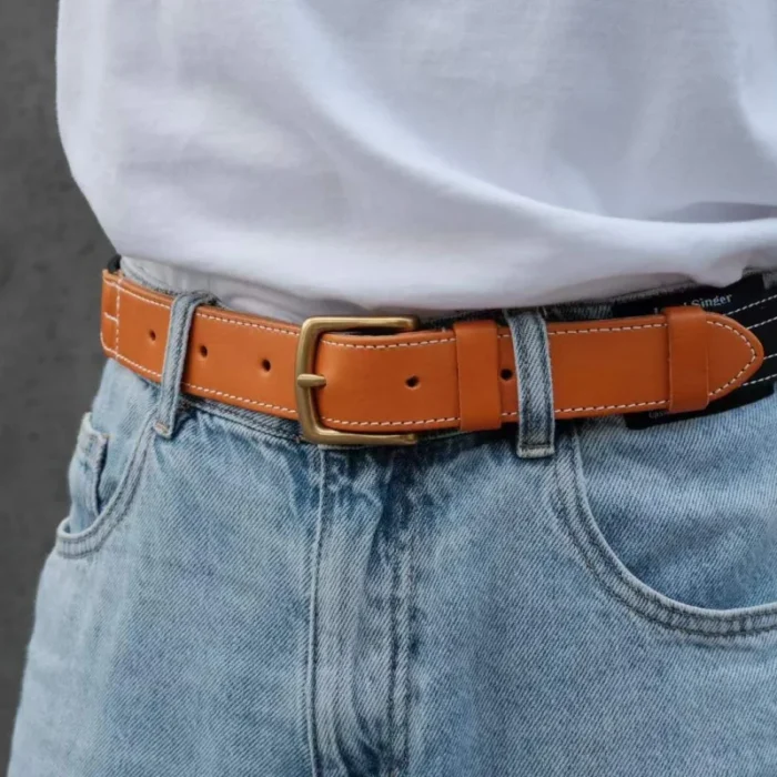 male model wearing black canvas leather belt for versatile everyday outfit