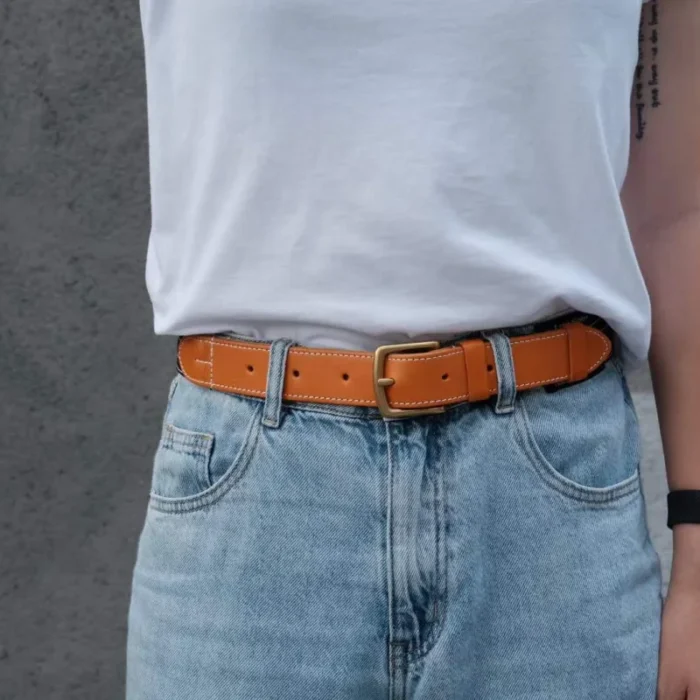 male model wearing black canvas leather belt for versatile everyday outfit