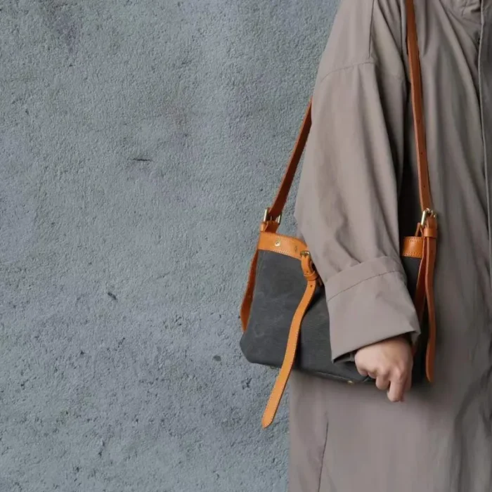 Model wearing Large Canvas Leather Shoulder Bag crossbody – unisex urban style