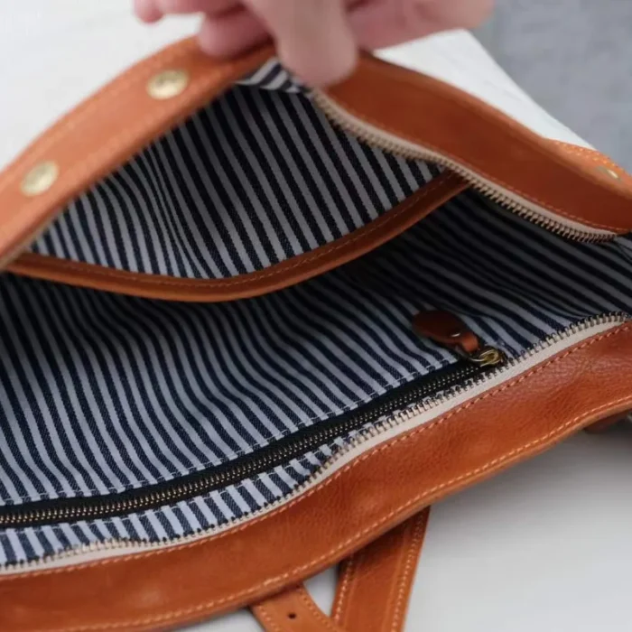 Inside view – fits tablet, wallet, water bottle and daily essentials
