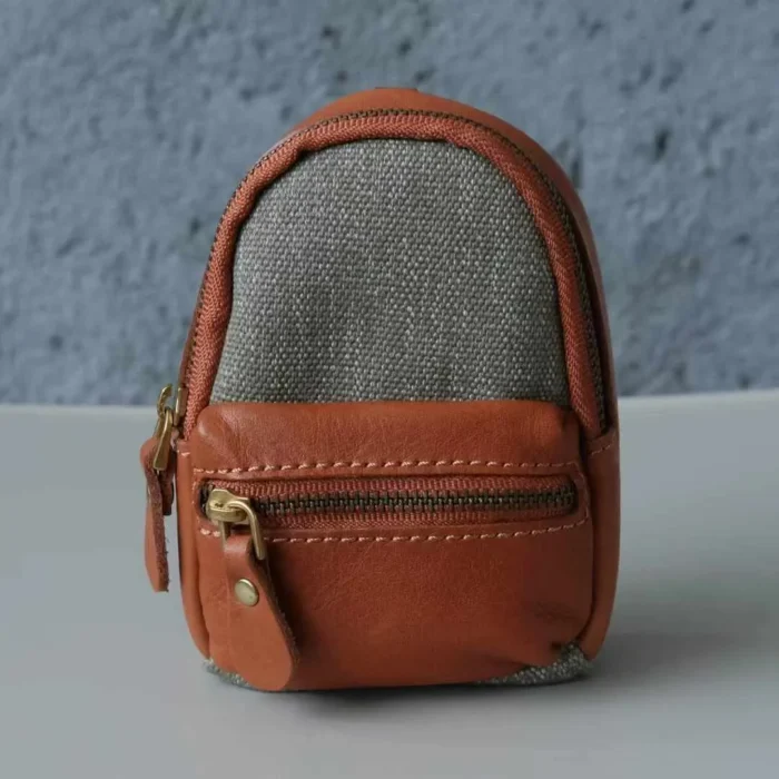Poplar Green Mini Backpack Charm, natural vegetable-tanned leather with vintage brass details