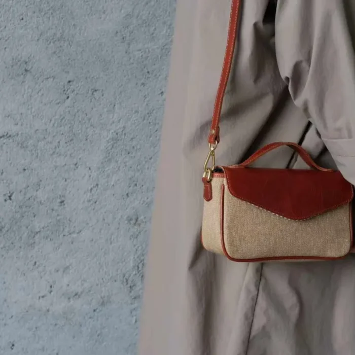 Tucker Yellow Pepper & Salt Canvas Bag over shoulder, showcasing vintage texture