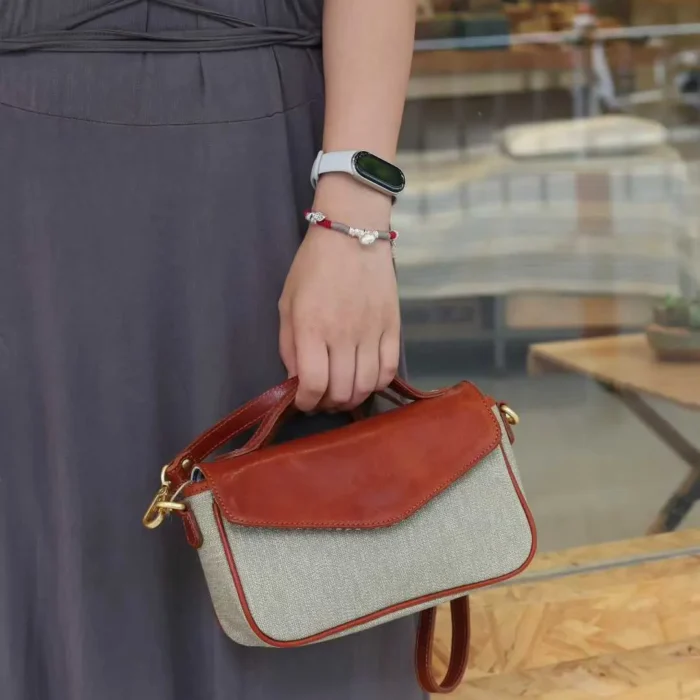 Pepper Salt Canvas Bag carried by hand for a neat, professional look