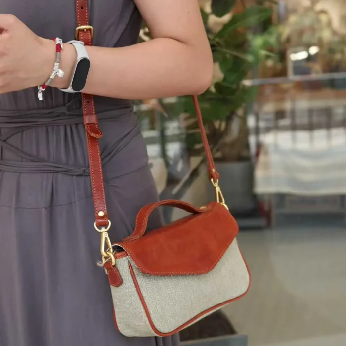 Pepper Salt Crossbody Bag worn as a shoulder bag, showing hands-free comfort