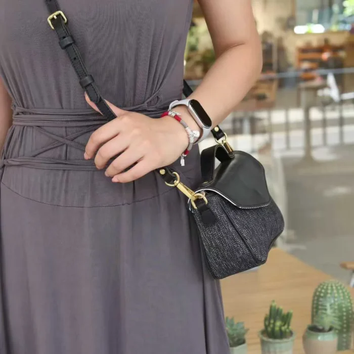 Tucker Yellow Pepper Salt bag worn crossbody, highlighting security and mobility