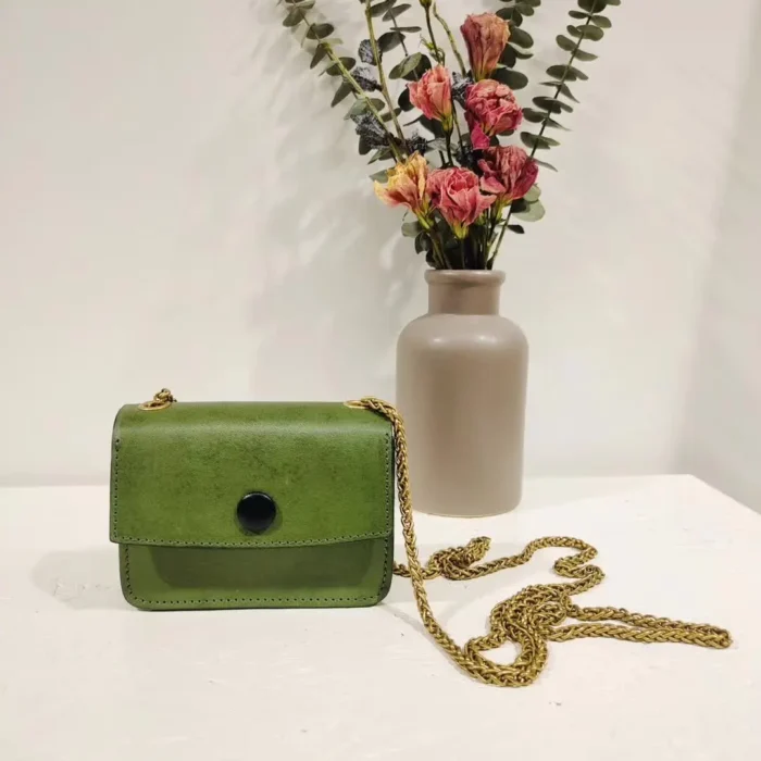 Vegetable-Tanned Leather Mini Crossbody Bag in Matcha Green, a calming, natural aesthetic perfect for serene style.