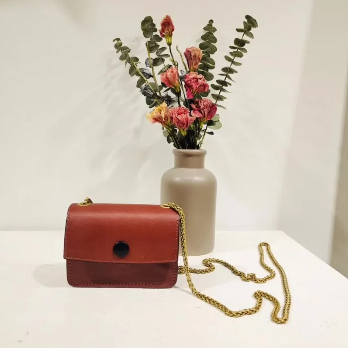 Vegetable-Tanned Leather Mini Crossbody Bag in Deep Brown, a timeless, vintage-inspired pouch designed for longevity.