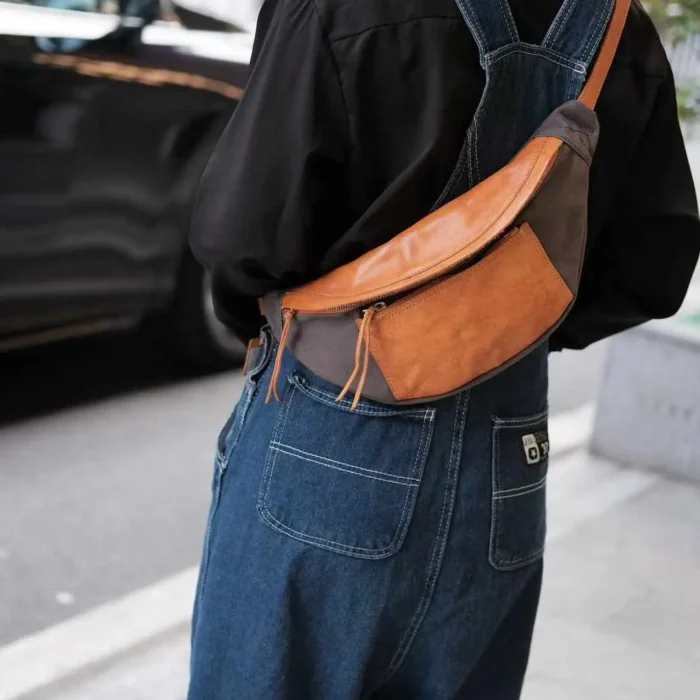 Man wearing Military GreenWoman wearing Deep Gray Canvas Leather Sling Bag as a trendy chest bag. Canvas Leather Sling Bag as a crossbody for street style.