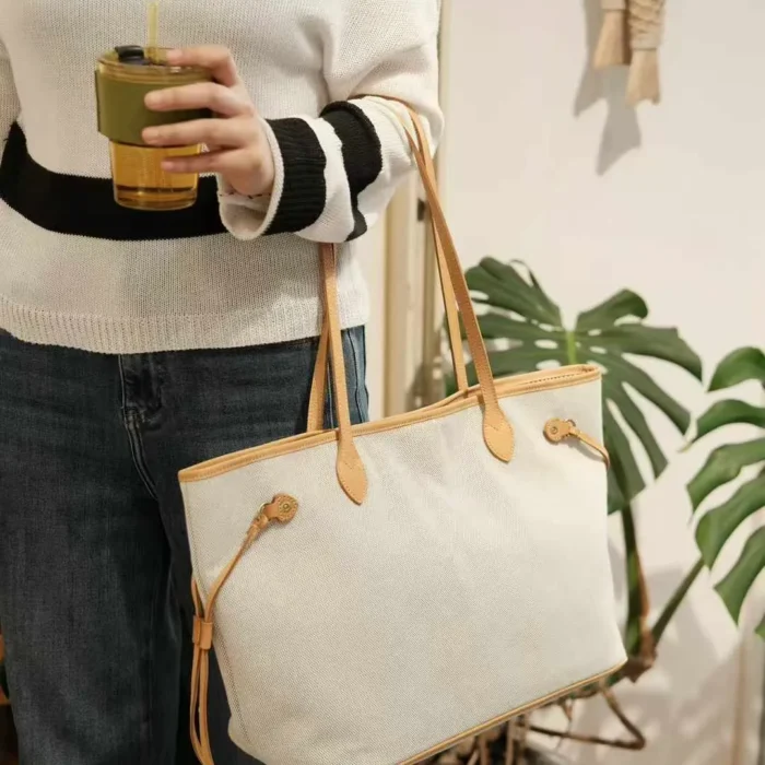 Elegant hand-carry style of the Veg-Tanned Leather Trim Tote