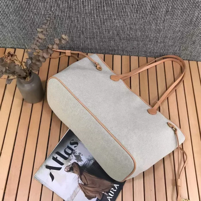 Gentle Apricot Trim color on the spacious canvas tote