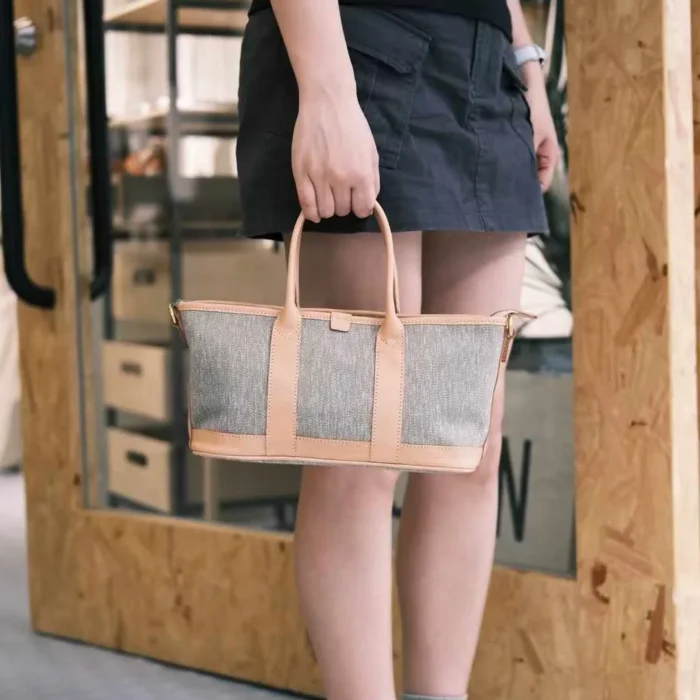 SYMONHO Multi-Bag worn in a relaxed, casual outfit, demonstrating the effortless style and lightweight feel of the canvas material.