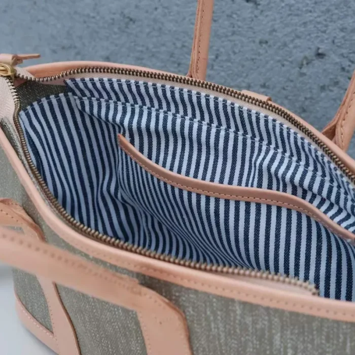View of the surprisingly spacious and secure interior lining of the SYMONHO Multi-Bag, designed for daily organization.