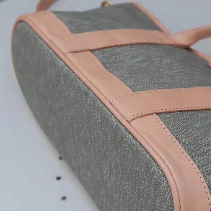 The structured bottom of the SYMONHO Multi-Bag, showing the durable canvas base designed to maintain the tote's shape.